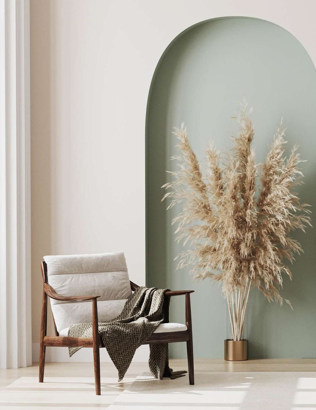 A chair beside a tall arched alcove